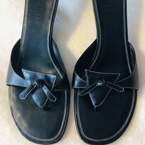 Cole Haan black leather thong mules with bow